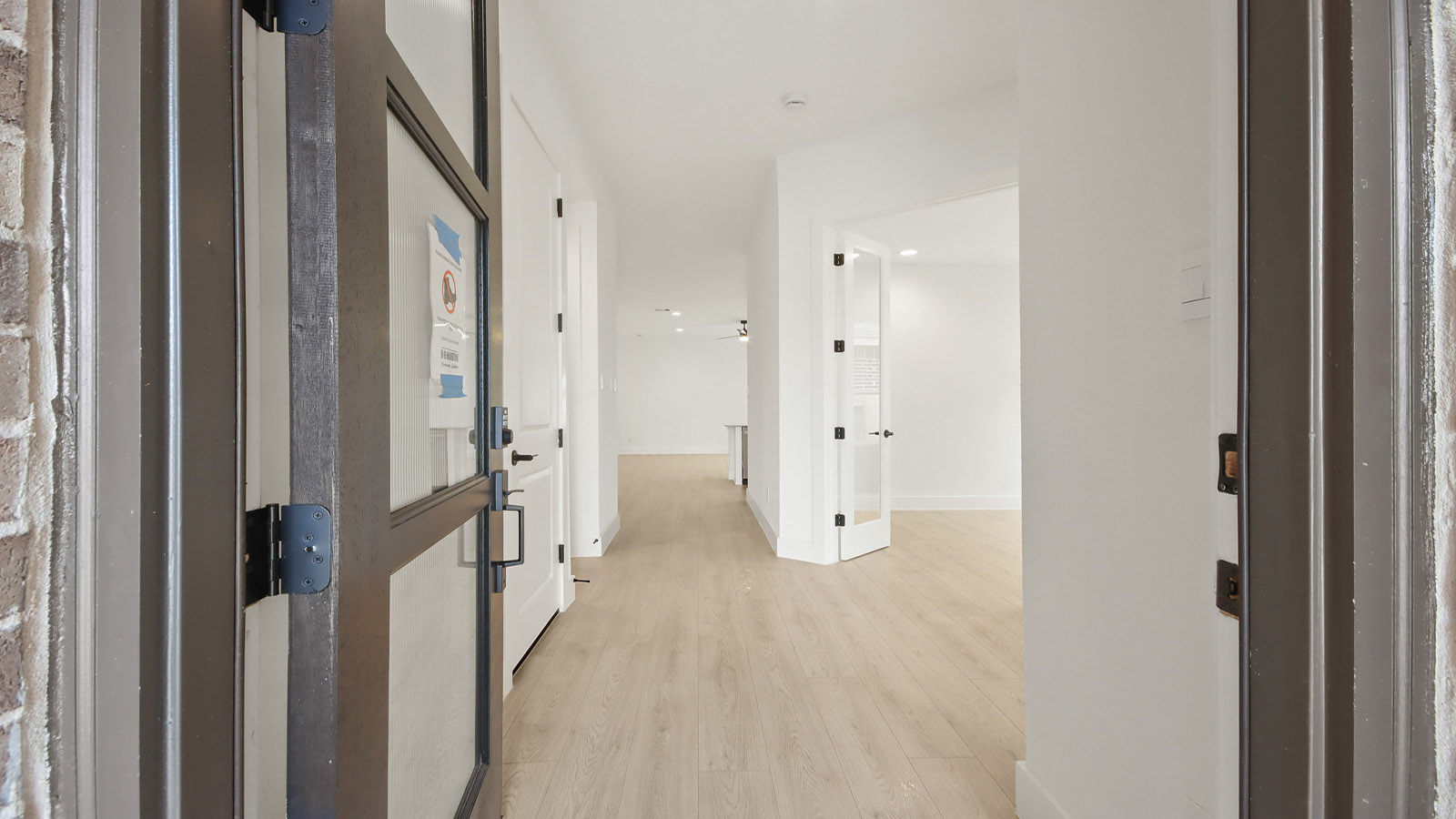 Entry hallway with vinyl flooring sherman williams painted walls
