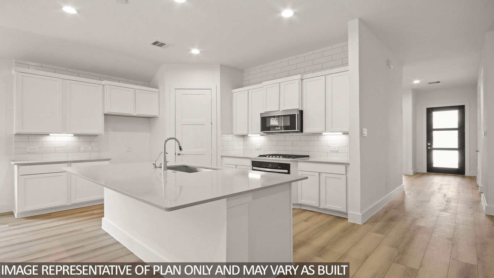 kitchen with stainless steel appliances and quartz countertops