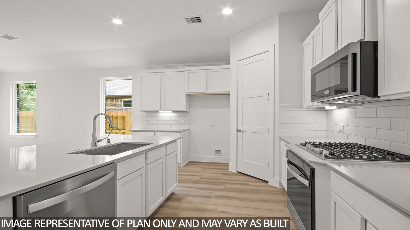 kitchen with stainless steel appliances and quartz countertops