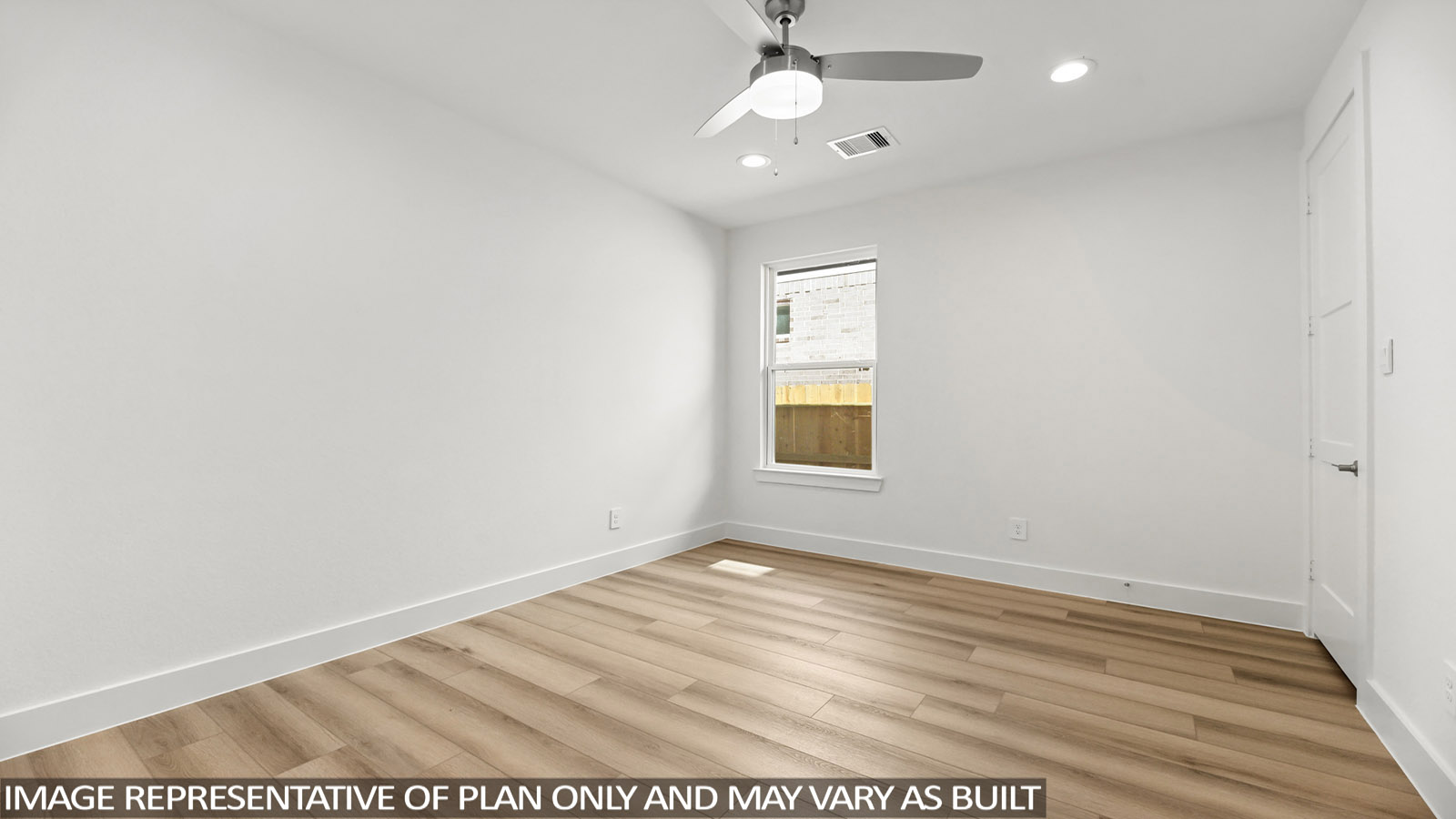 open concpt living and ding area with vinyl flooring and large windows