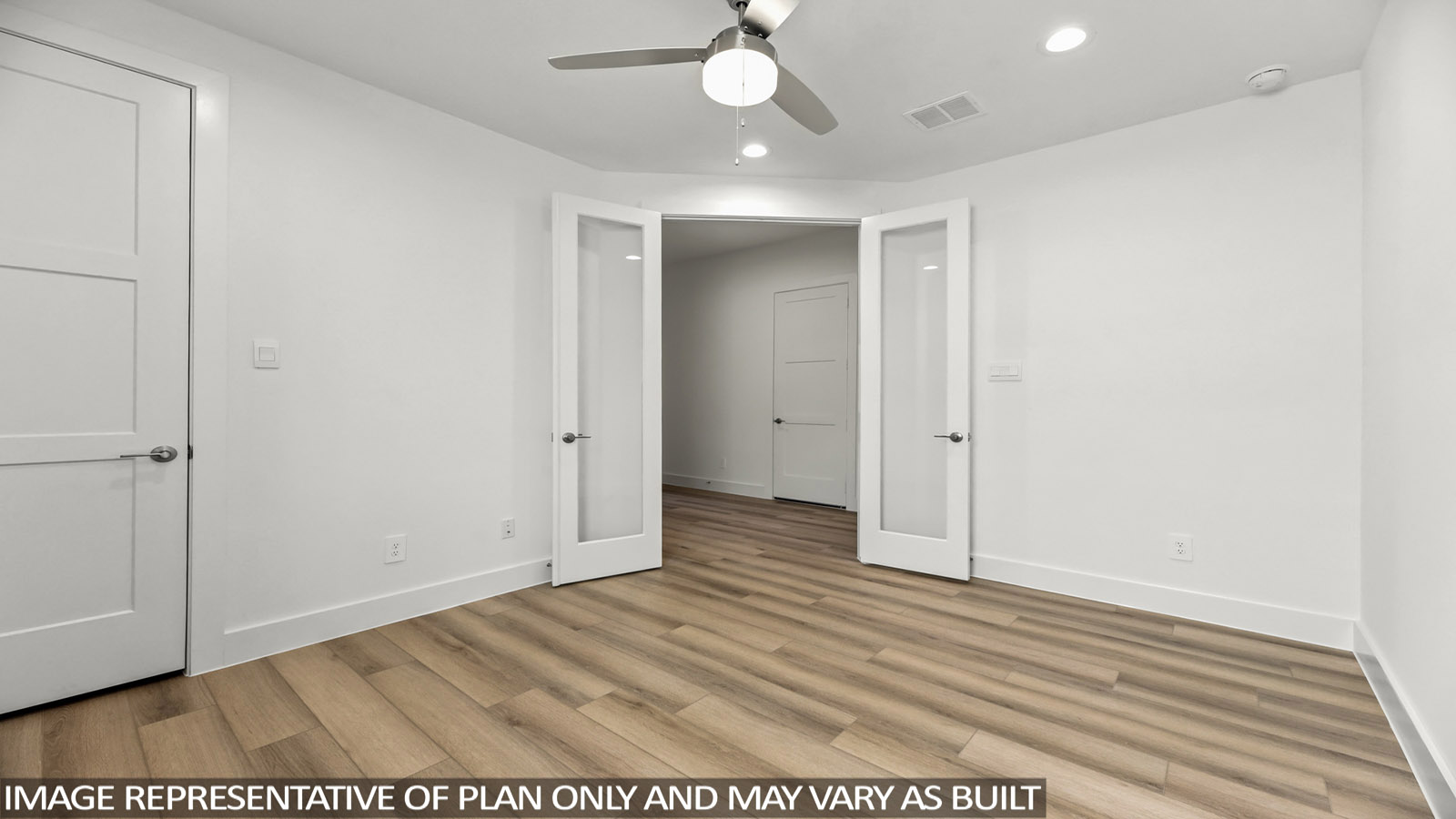 open concpt living and ding area with vinyl flooring and large windows