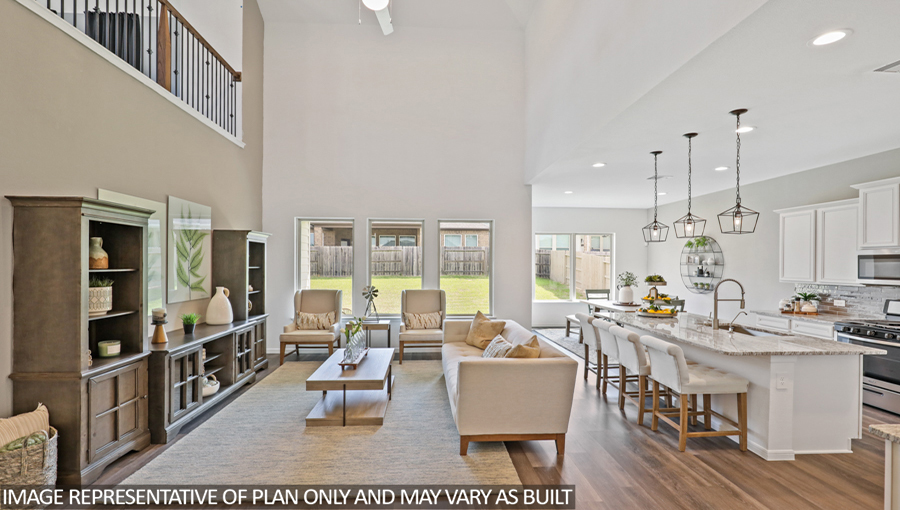 Open concept living, dining, and kitchen area