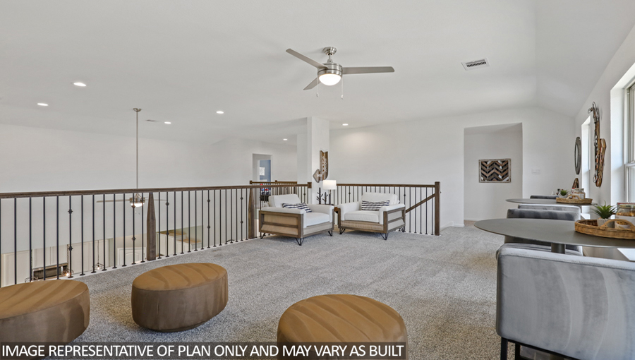 Second story game room with carpet flooring