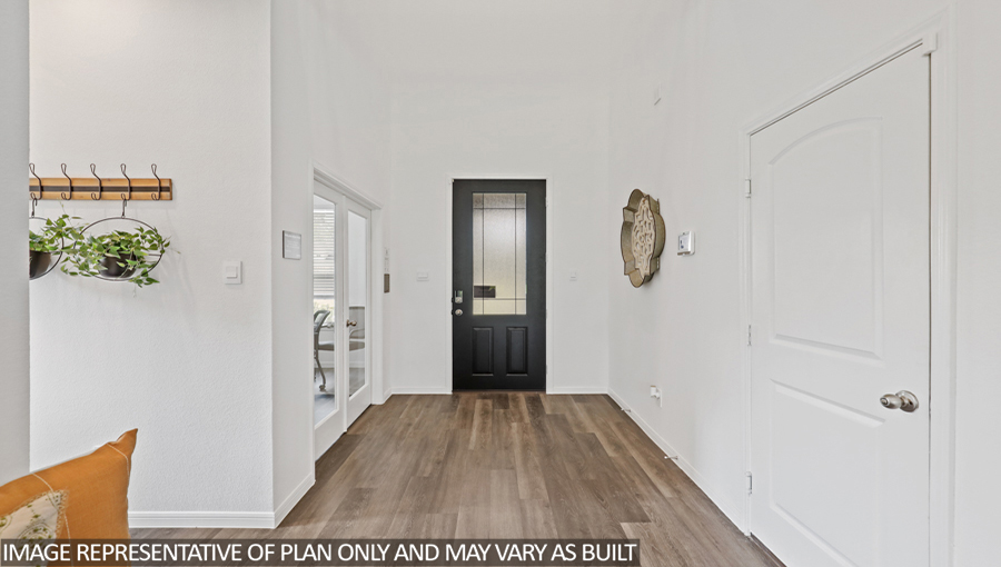 Entry hallway with vinyl flooring