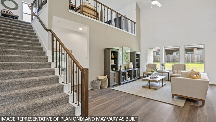 Open concept living, dining, and kitchen area