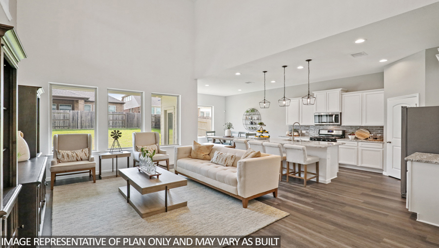 Open concept living, dining, and kitchen area