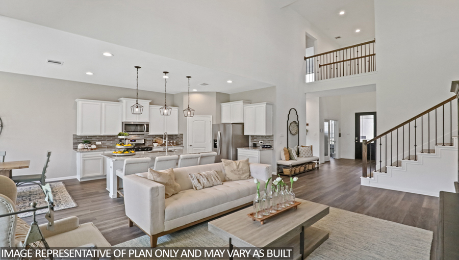 Open concept living, dining, and kitchen area