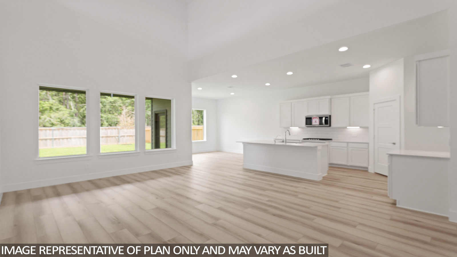 Open concept living, dining, and kitchen area