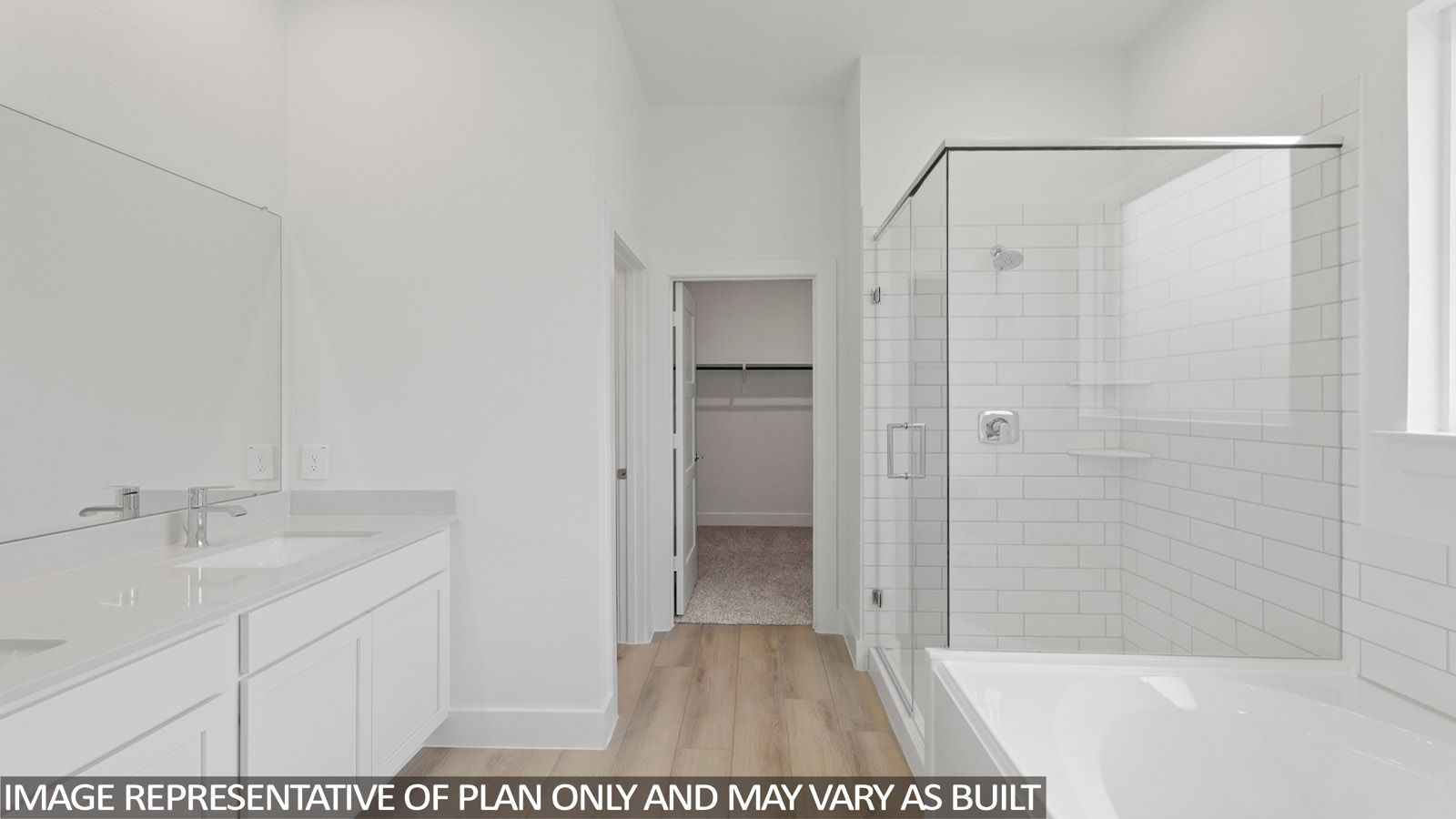 Primary bathroom with tub and shower