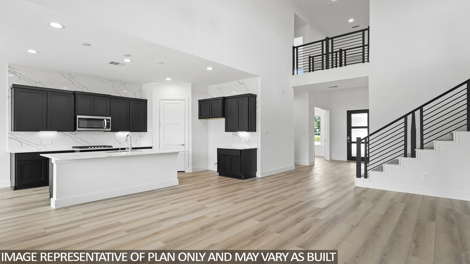 Spacious living area with vinyl flooring