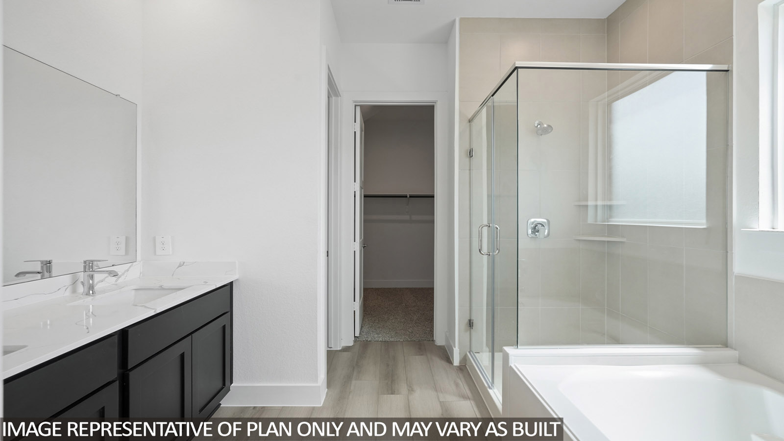 Primary bathroom with tub and shower