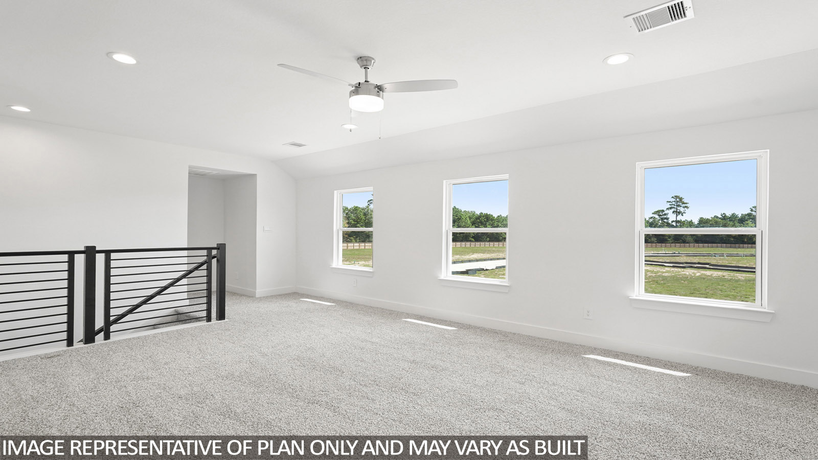Second story game room with carpet flooring
