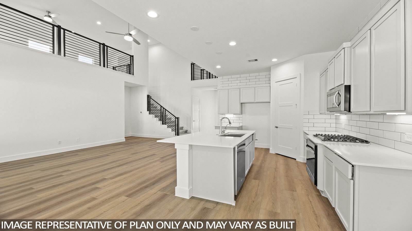 open concept living area with vinyl flooring, large windows and high ceilings