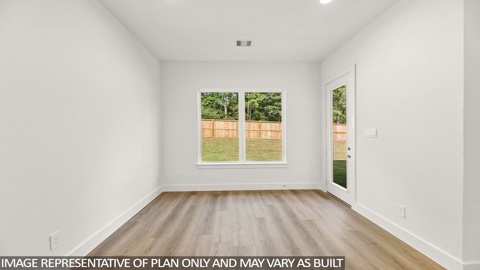 bedroom with carpet flooring and windows