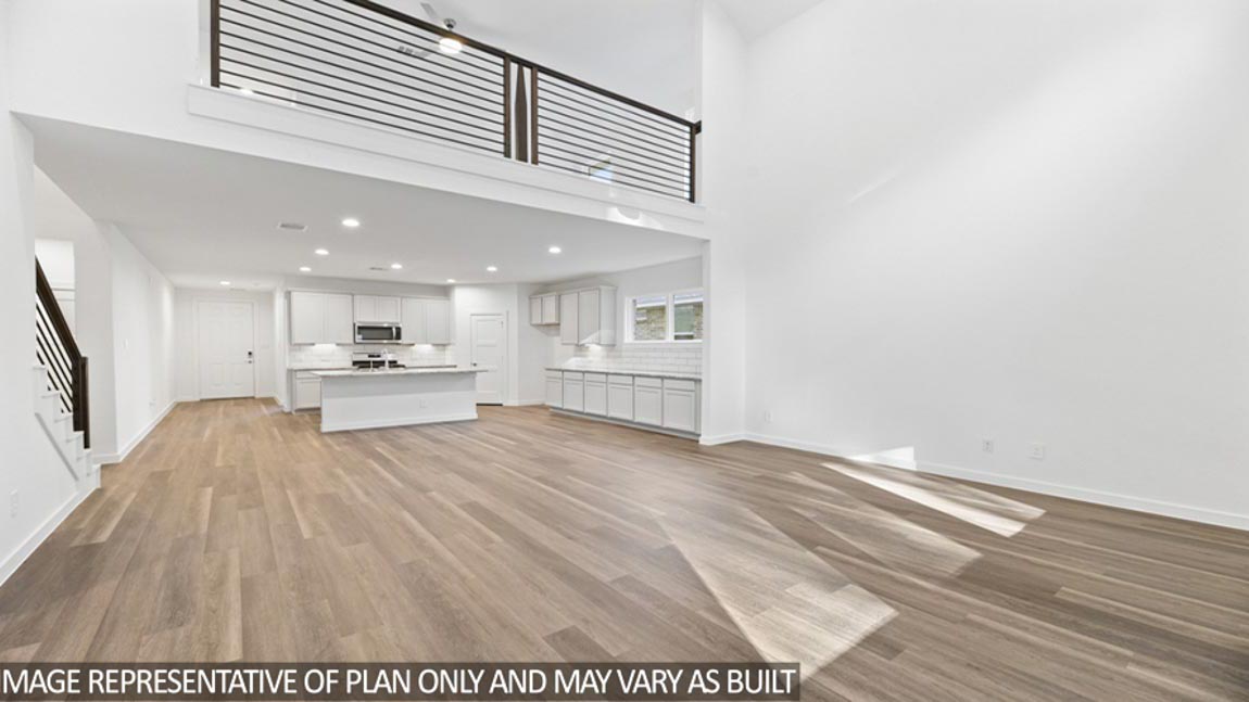 Open concept living, dining, and kitchen area