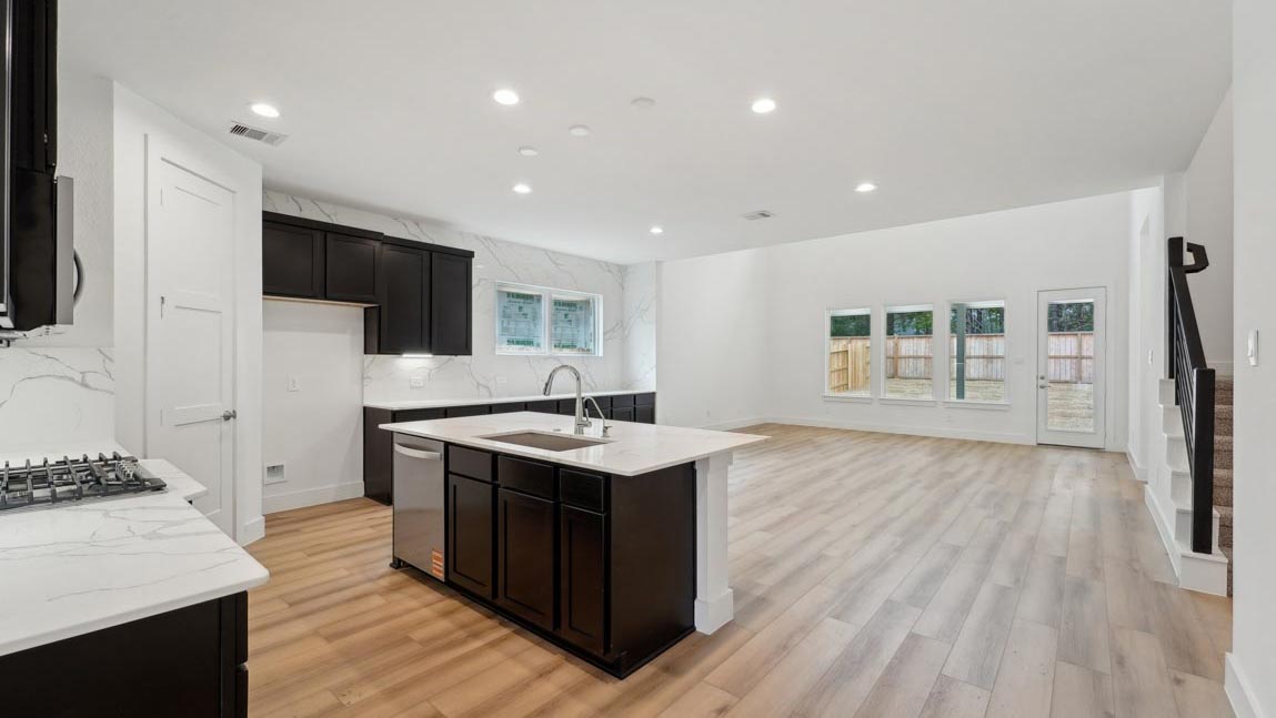 kitchen with stainless steel appliances and quartz countertops
