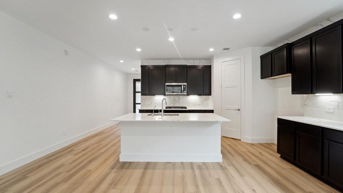 kitchen with stainless steel appliances and quartz countertops