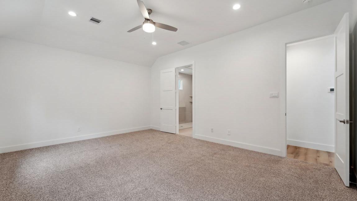 bedroom with carpet flooring and windows