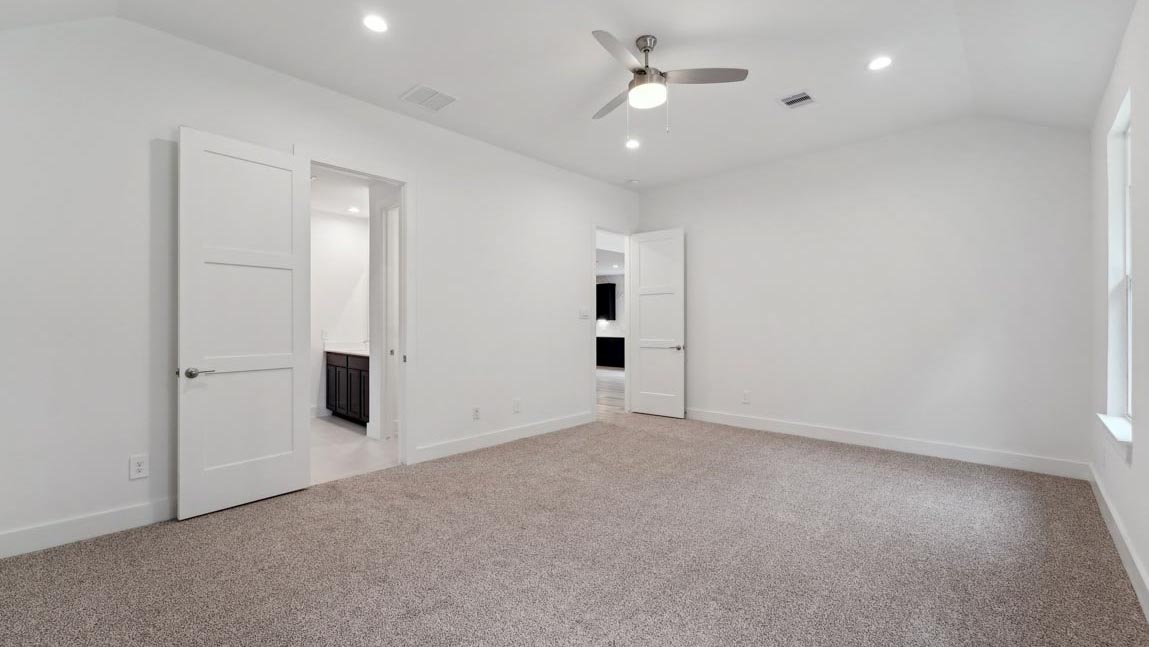 bedroom with carpet flooring and windows