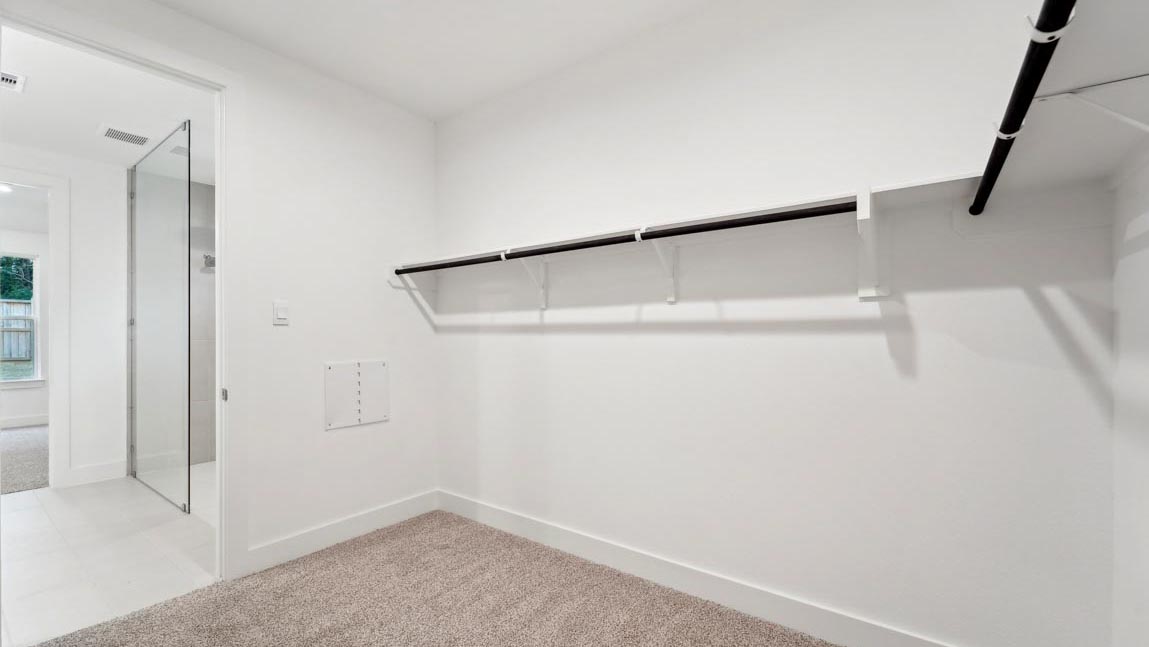 bedroom with carpet flooring and windows