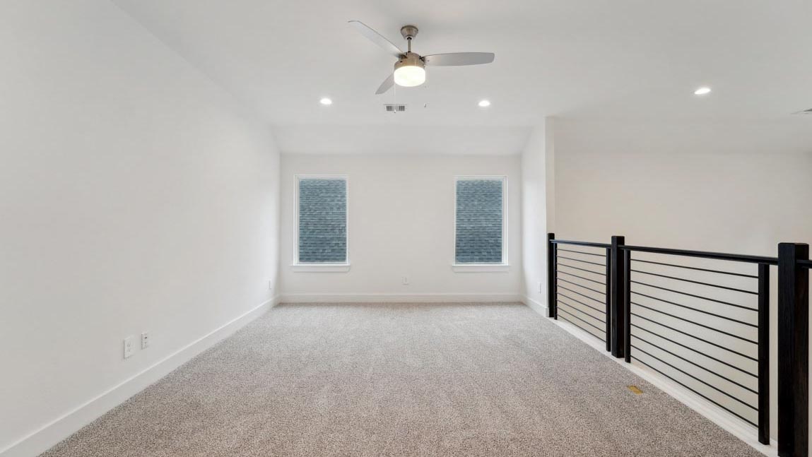 bedroom with carpet flooring and windows