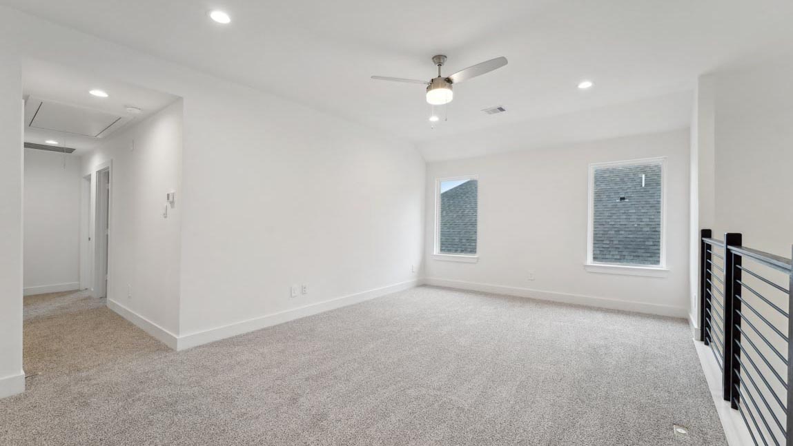 bedroom with carpet flooring and windows