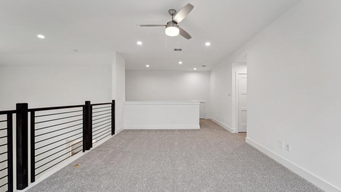 bedroom with carpet flooring and windows