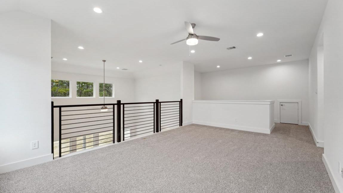 bedroom with carpet flooring and windows