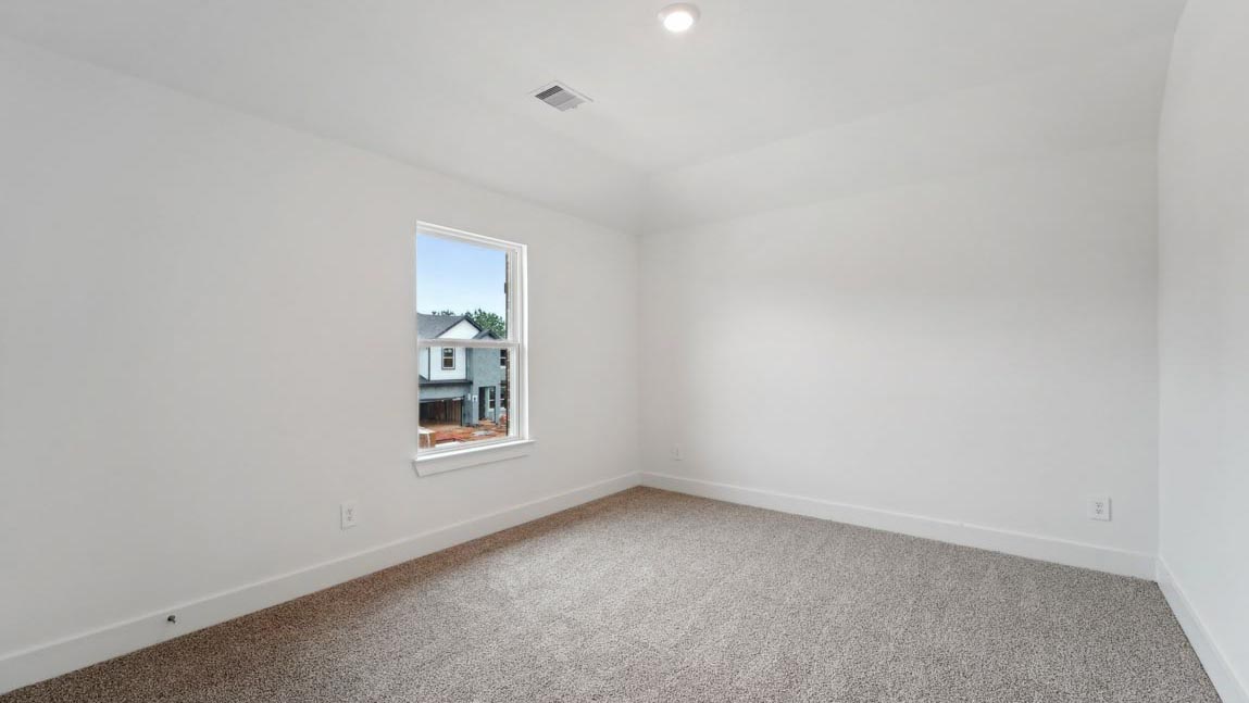 bedroom with carpet flooring and windowsbedroom with carpet flooring and windows