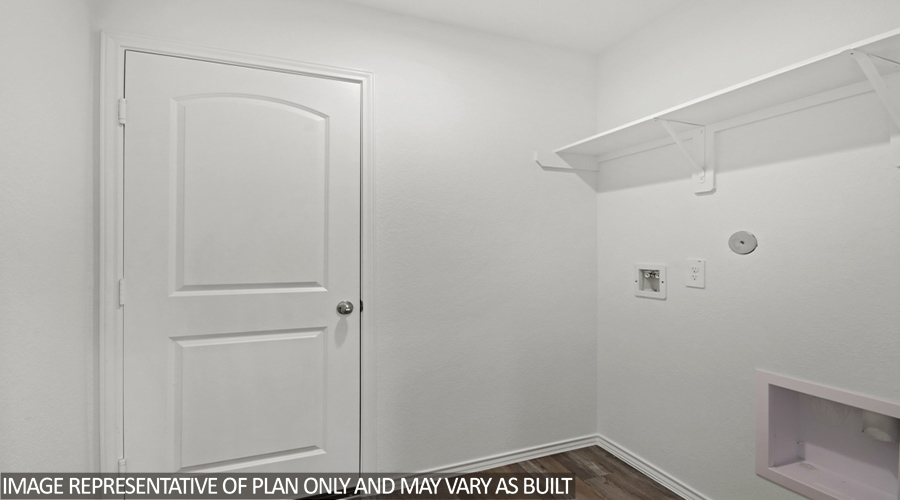 Utility room with overhead space for storage.