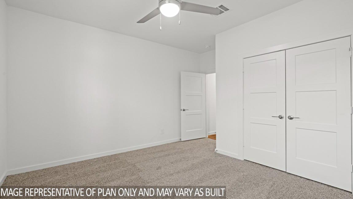 Secondary bedroom with bright windows