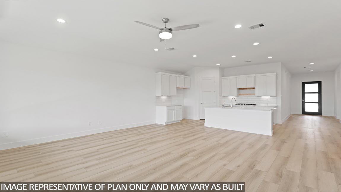 Open concept living, dining, and kitchen area