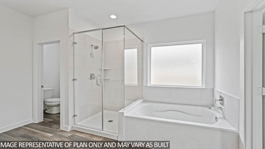 Interior bathroom with bathtub and stand up shower
