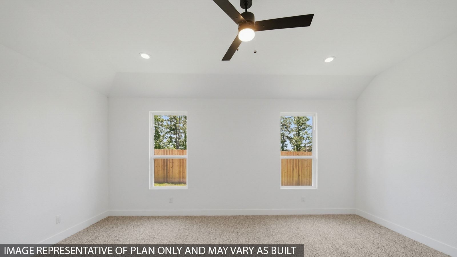 Large Primary bedroom with shag carpet flooring and bright window