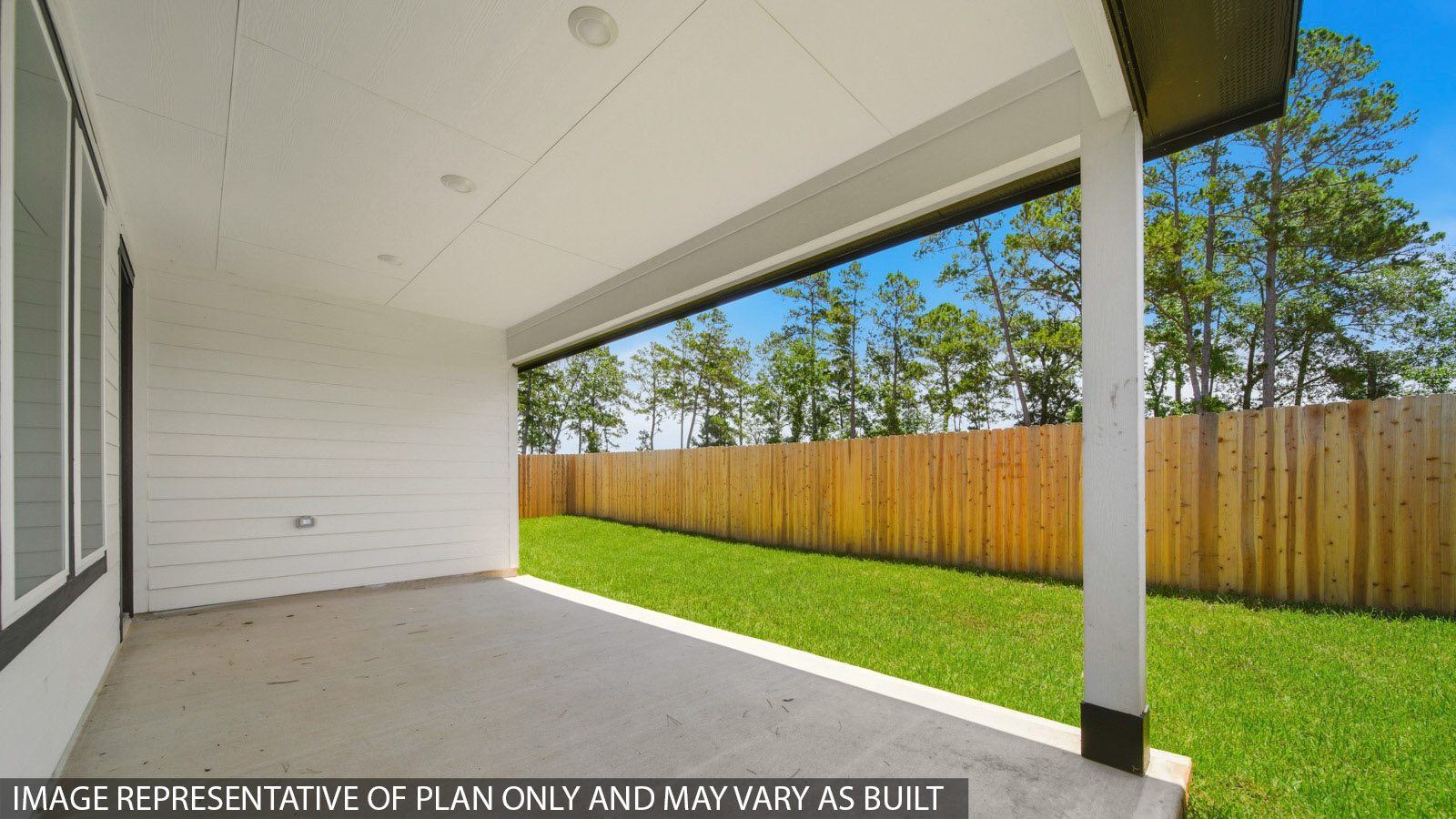 covered patio with jamies hardie siding and overhead lighting