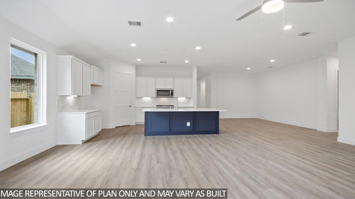 Open concept living, dining, and kitchen area