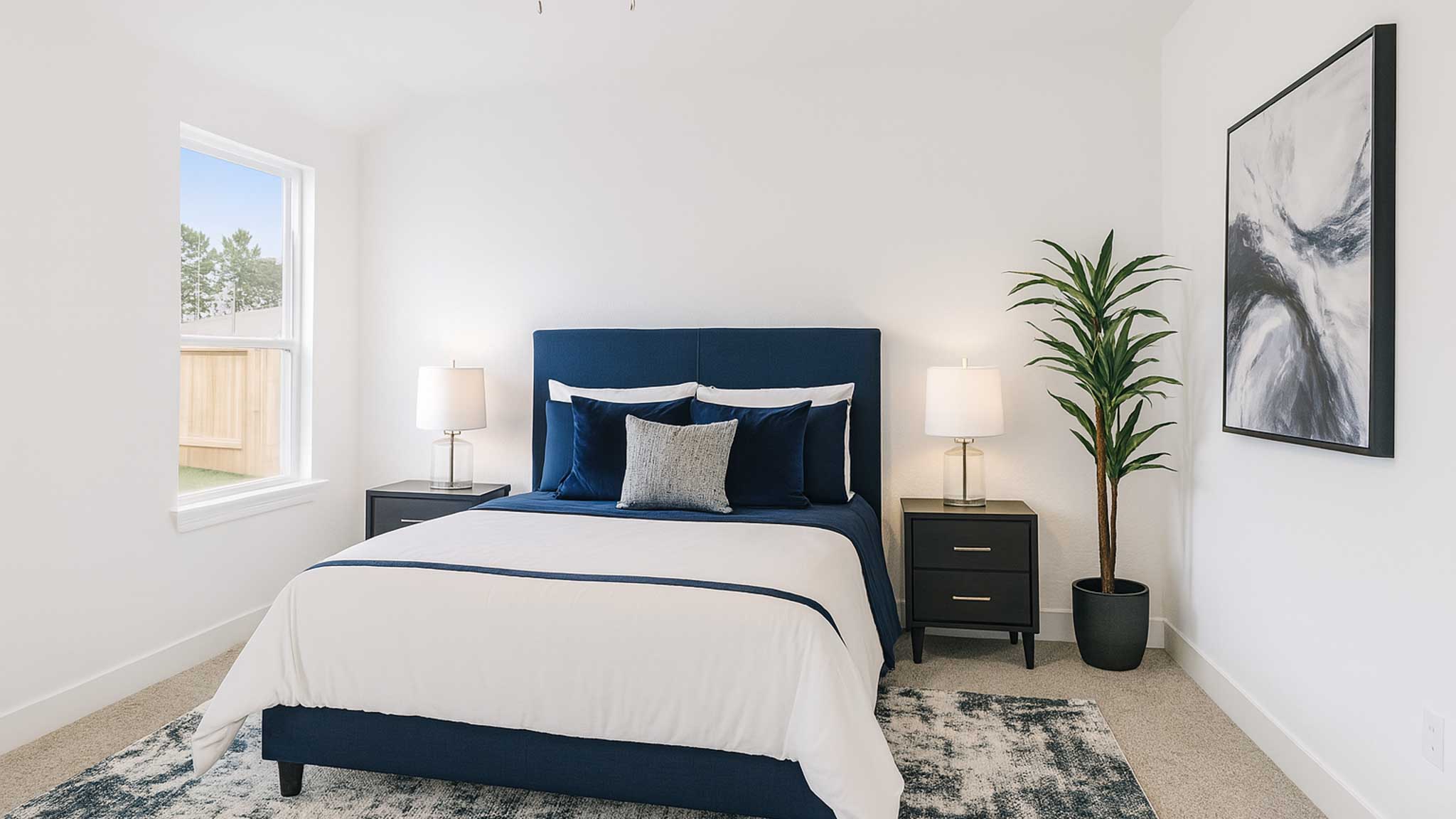 Primary bedroom with carpet flooring