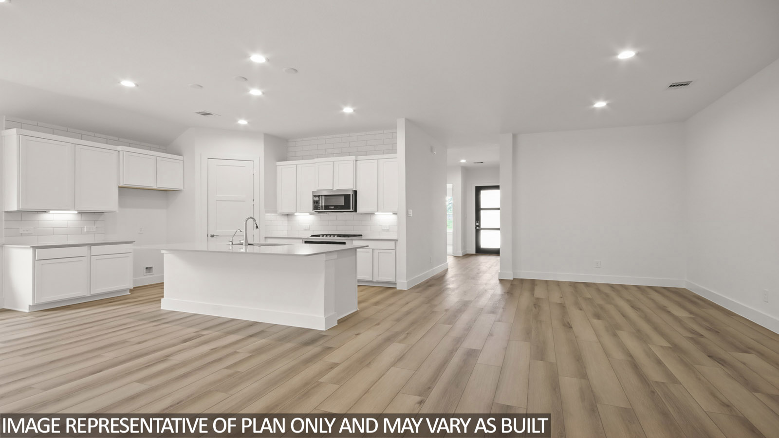 Open kitchen with an island, stainless steel appliances, white walls, and vinyl wood flooring.