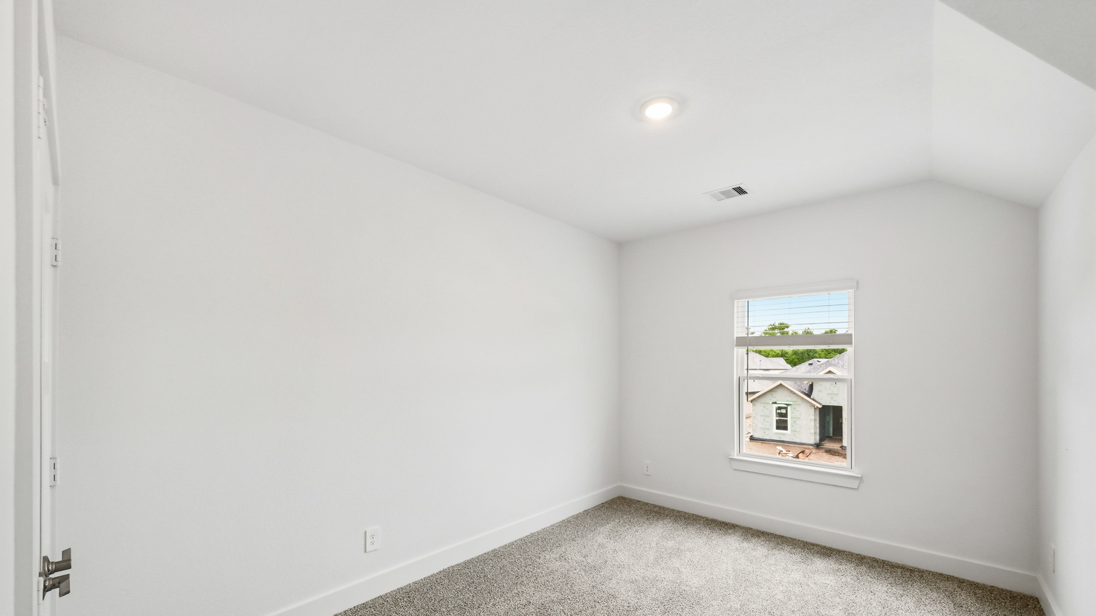 Secondary bedroom with bright window