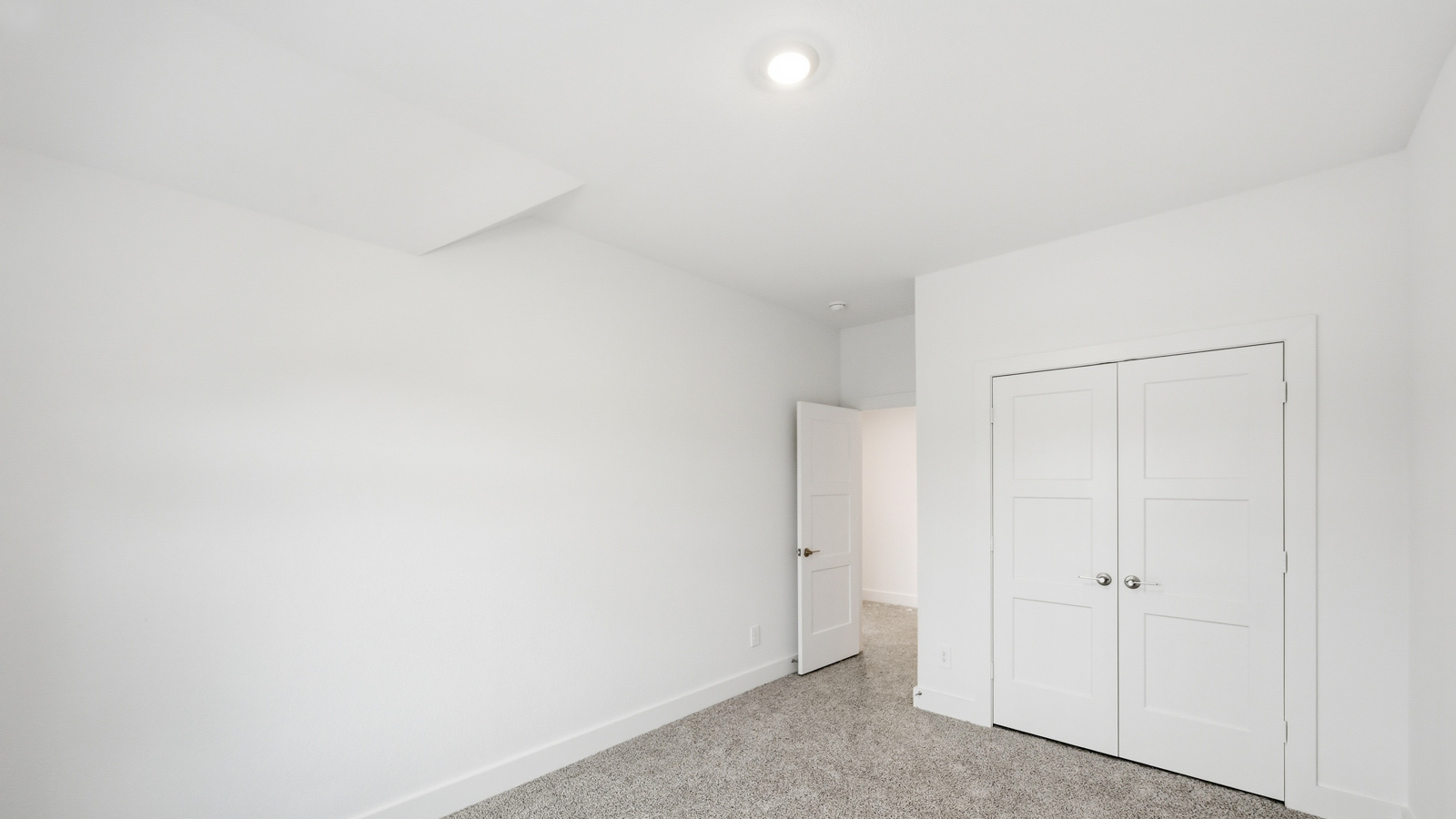 Secondary bedroom with bright window