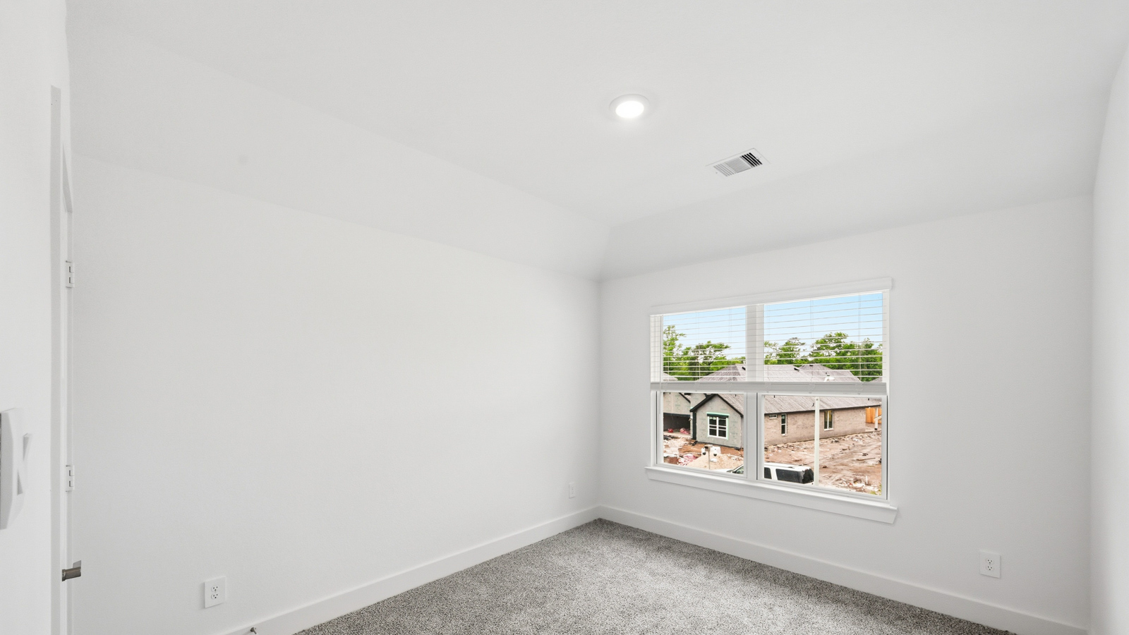 Secondary bedroom with bright window