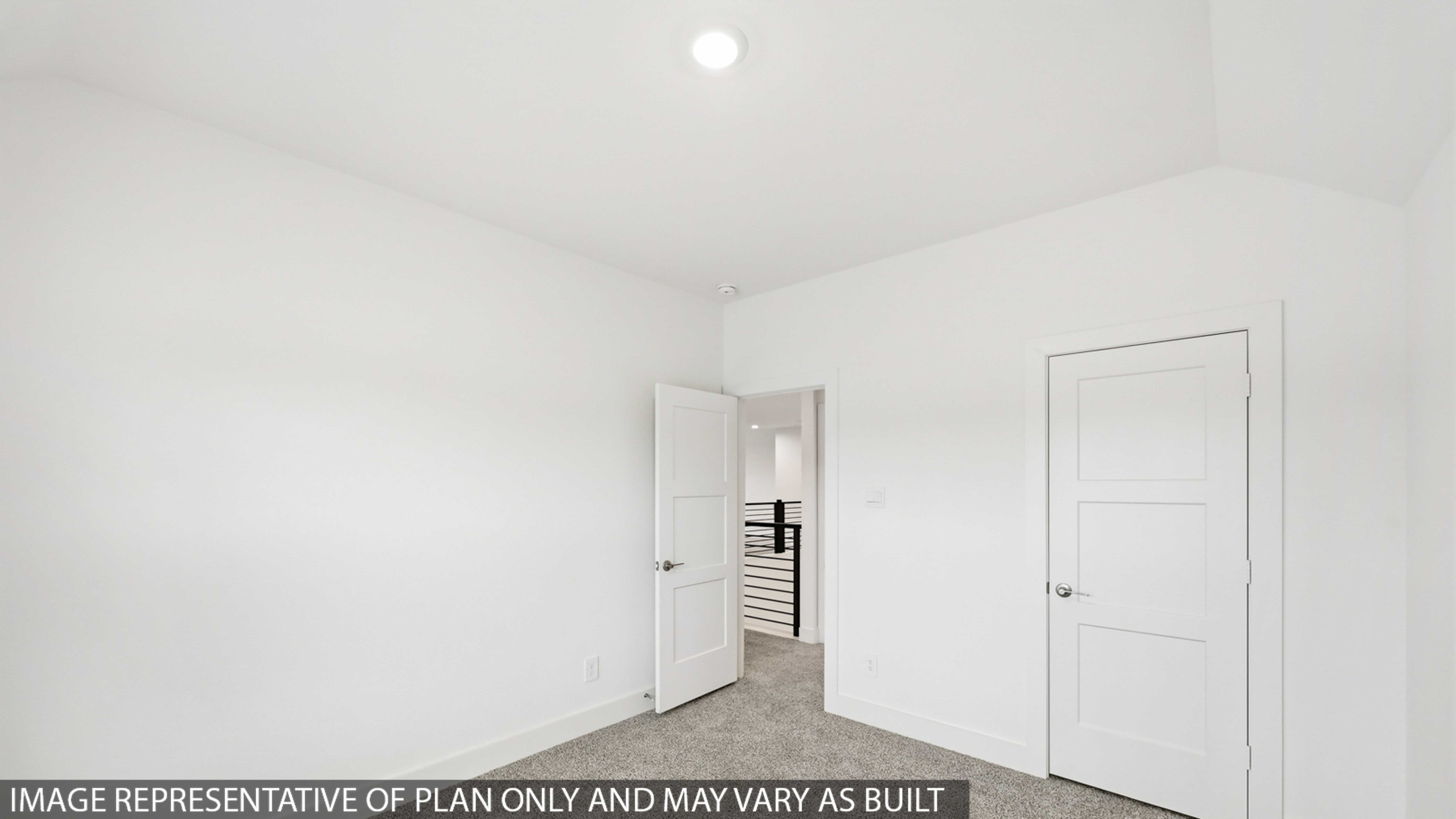 Large Primary bedroom with shag carpet flooring and bright window