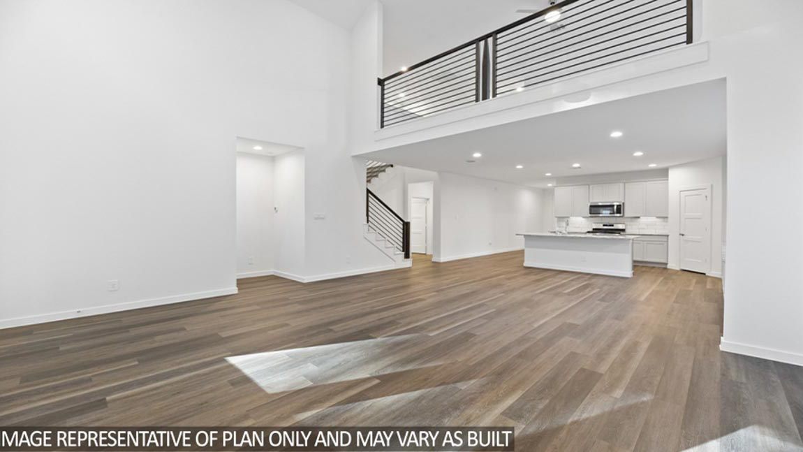 Open concept living, dining, and kitchen area