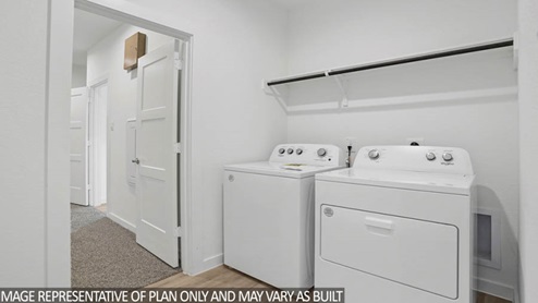 laundry room with closet rod and shelf