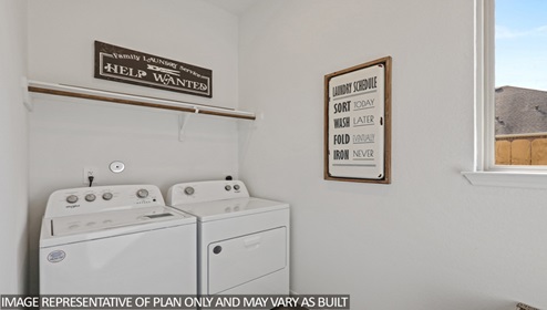 laundry room with a closet rod and shelf