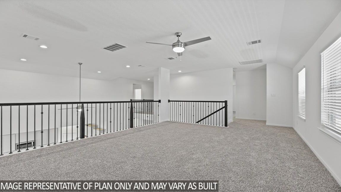 Upstairs loft with balcony.