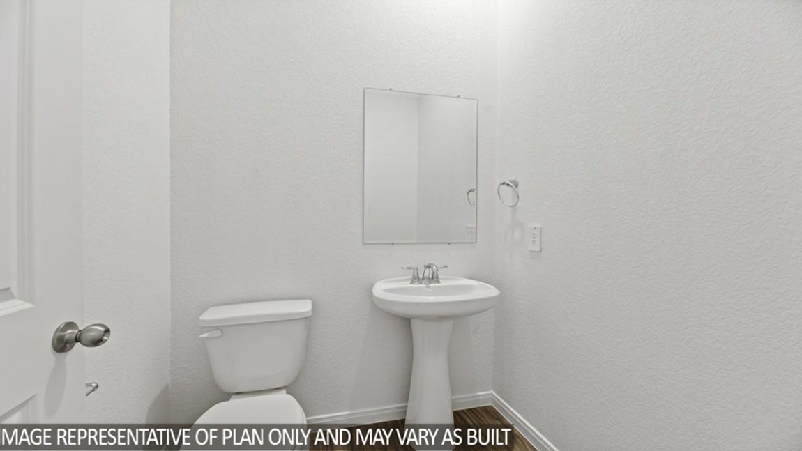 Powder room with pedestal sink.