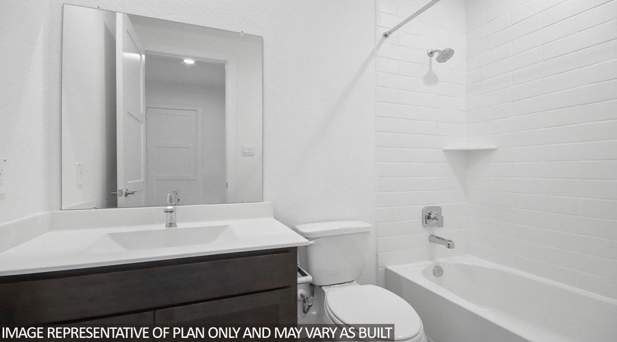 Secondary bathroom with tub/shower combo.