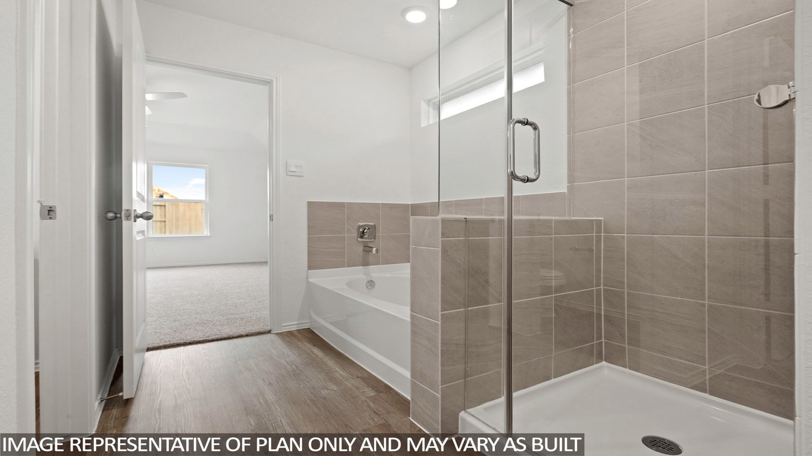 Primary bathroom with dual sinks, shower, tub, white walls, and vinyl wood flooring.