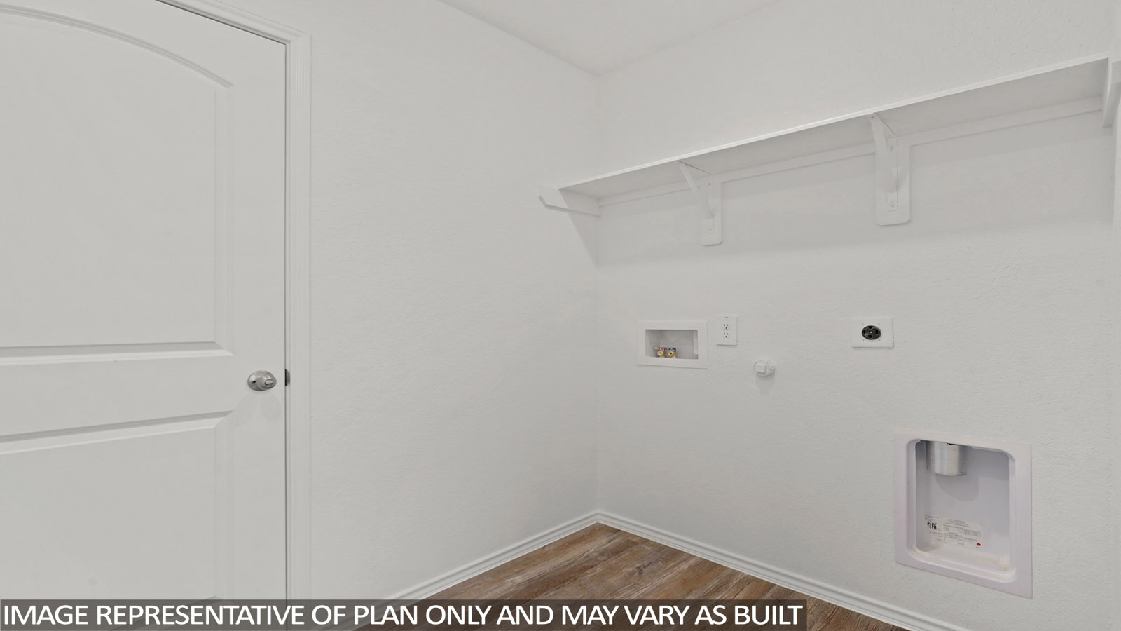 Laundry room with white walls and vinyl wood flooring.
